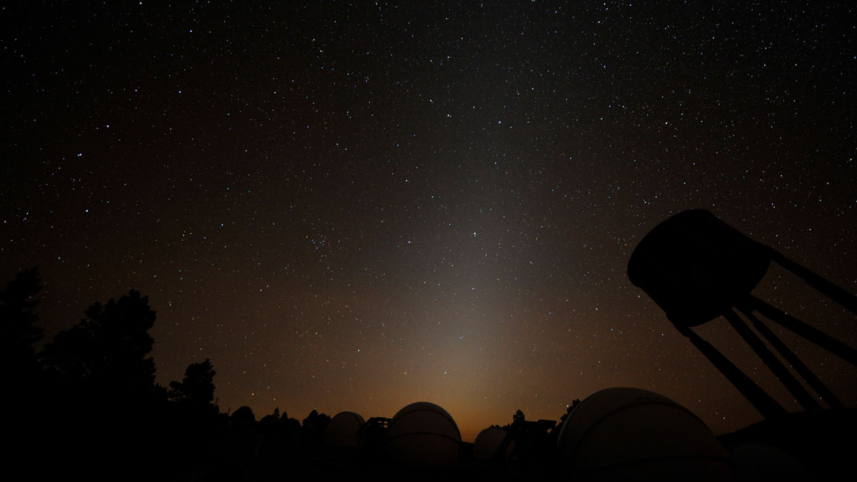 Sunlight reflecting off tiny, interplanetary “cosmic dust” particles