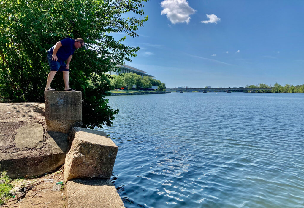 Riverkeeper Dean Naujoks at an outflow on the Potomac River