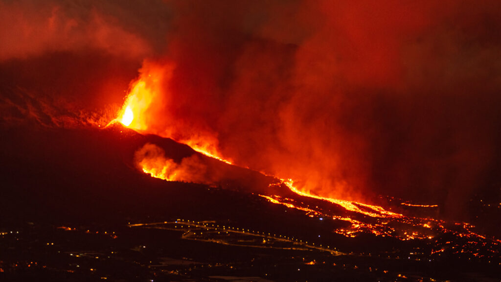 An image of lava reaching the surface at night during the eruption on La Palma, Canary Islands