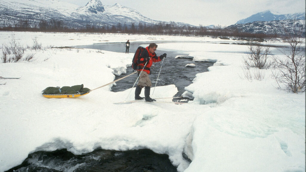 Tero Mustonen skis on a fieldwork assignment in Sarek National Park in Sweden.