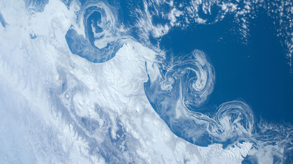 View from space of sea ice floes and eddy currents near the coast of Russia’s Kamchatka Peninsula