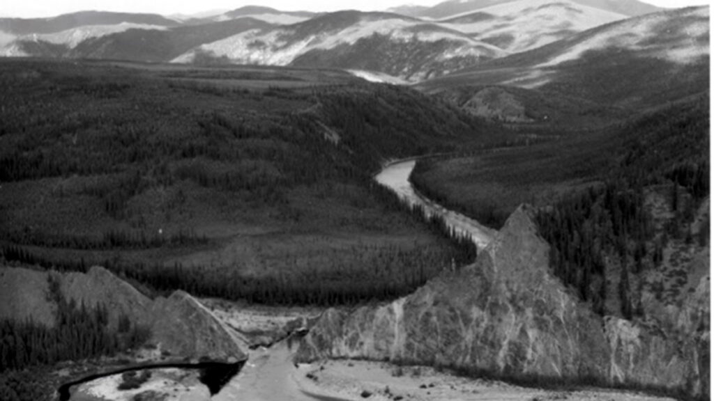 A black-and-white photograph of a river.