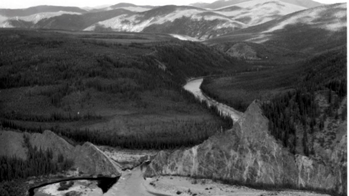 A black-and-white photograph of a river.