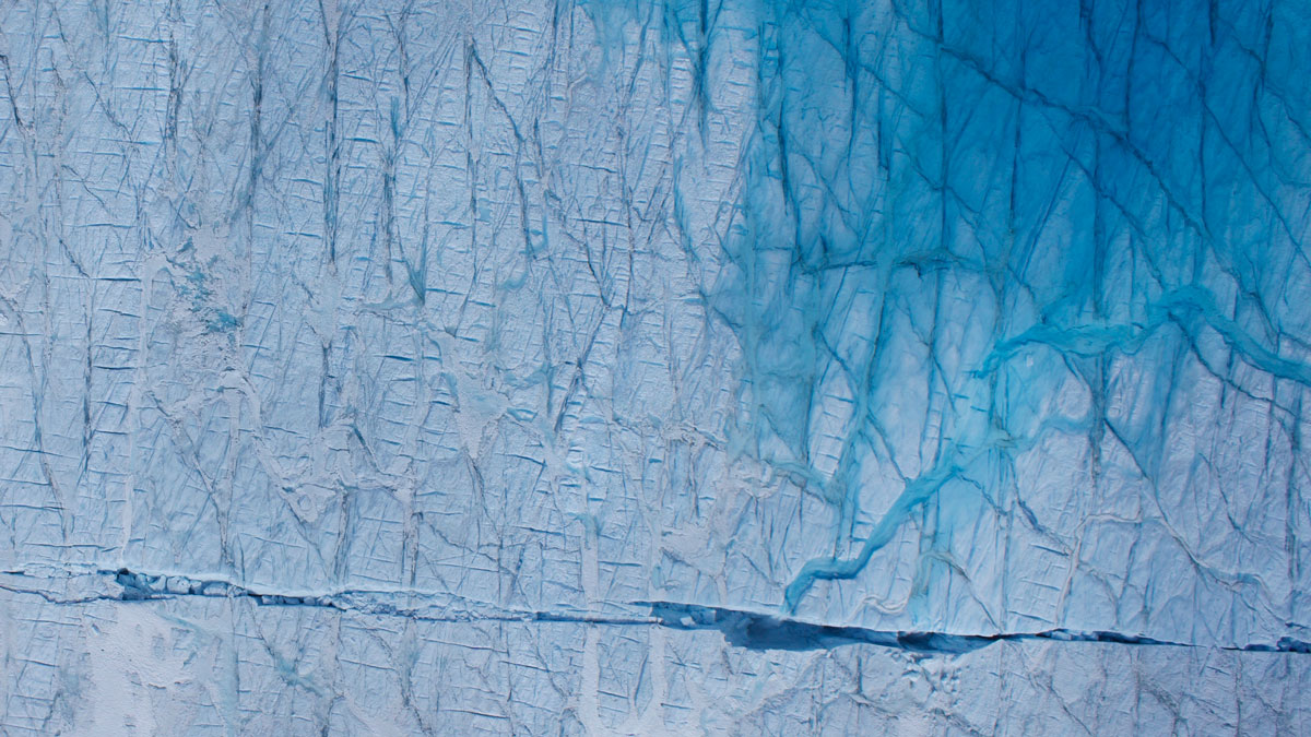 Meltwater draining through a crack in a glacier