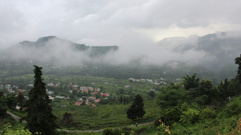 Rain clouds hang over a valley in Uttarakhand, India.