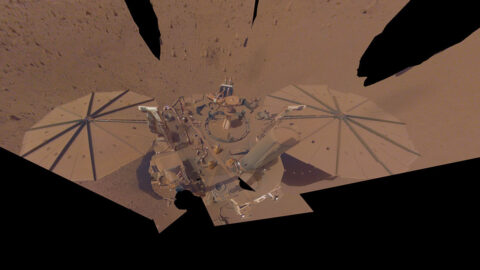 NASA’s InSight lander, covered in dust on Mars
