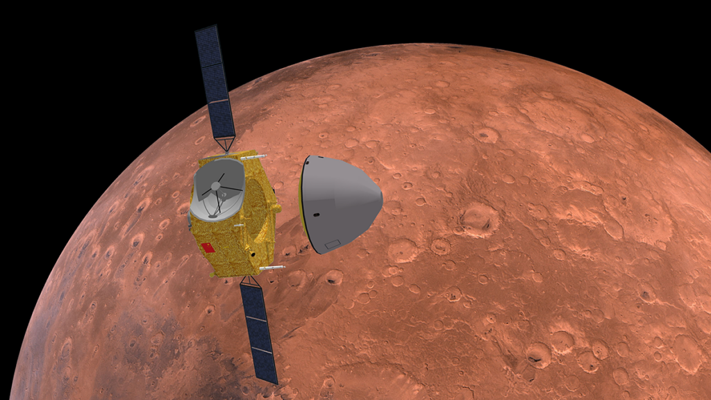 A gold-colored spacecraft with large solar panels flies in front of Mars.