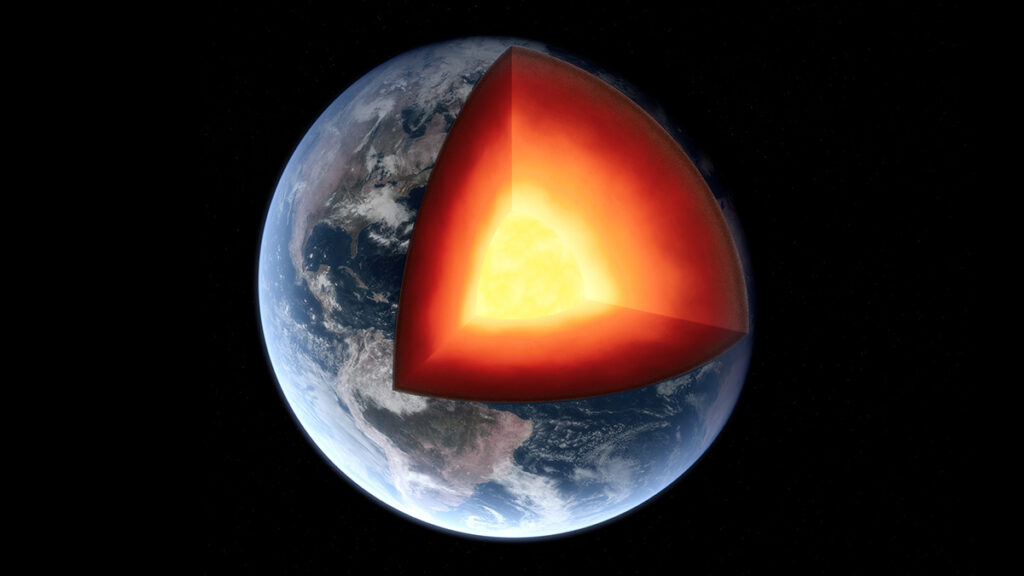 Artistic rendition of Earth with a section removed, exposing yellow, orange, and red layers