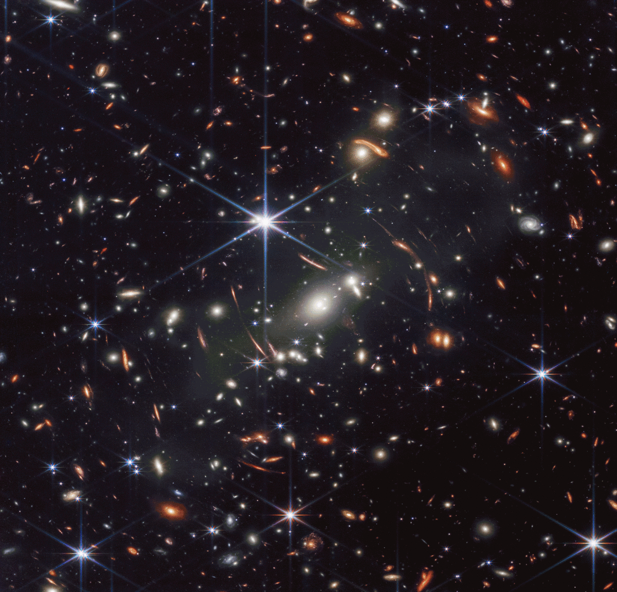 A gif showing the five first images from JWST, split into six images that flash for 2 seconds each. In order they are: the first deep field, the spectrum of WASP-96B, Stephan’s Quintet, the Southern Ring Nebula in near-infrared light, the Southern Ring Nebula in midinfrared light, and the Carina Nebula. Further descriptions of each image can be found within the article.