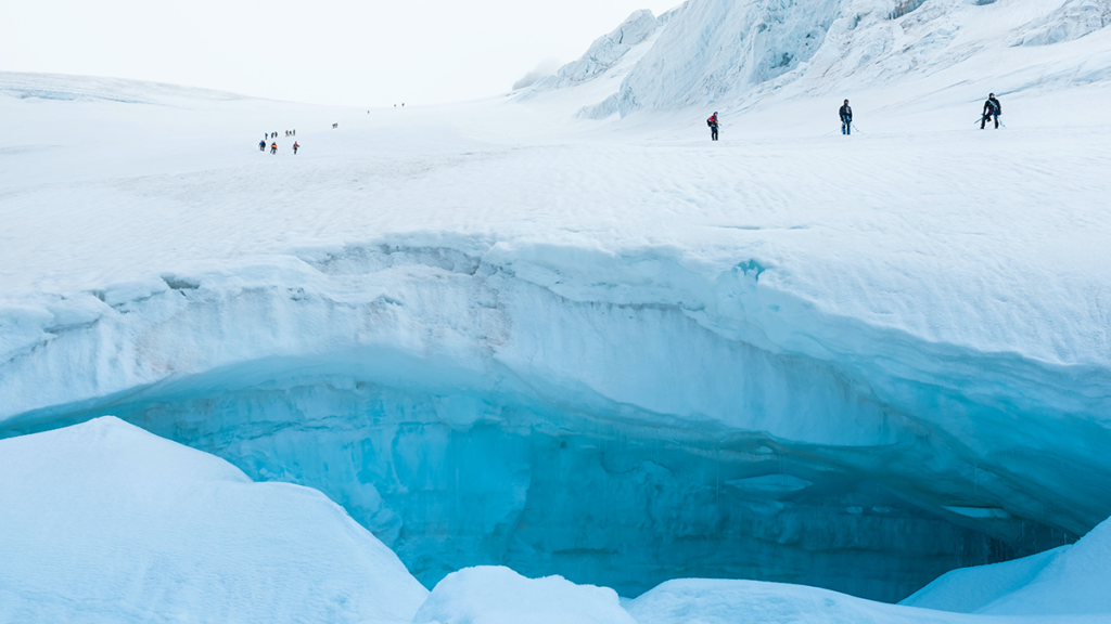 Photo of people on a glacier