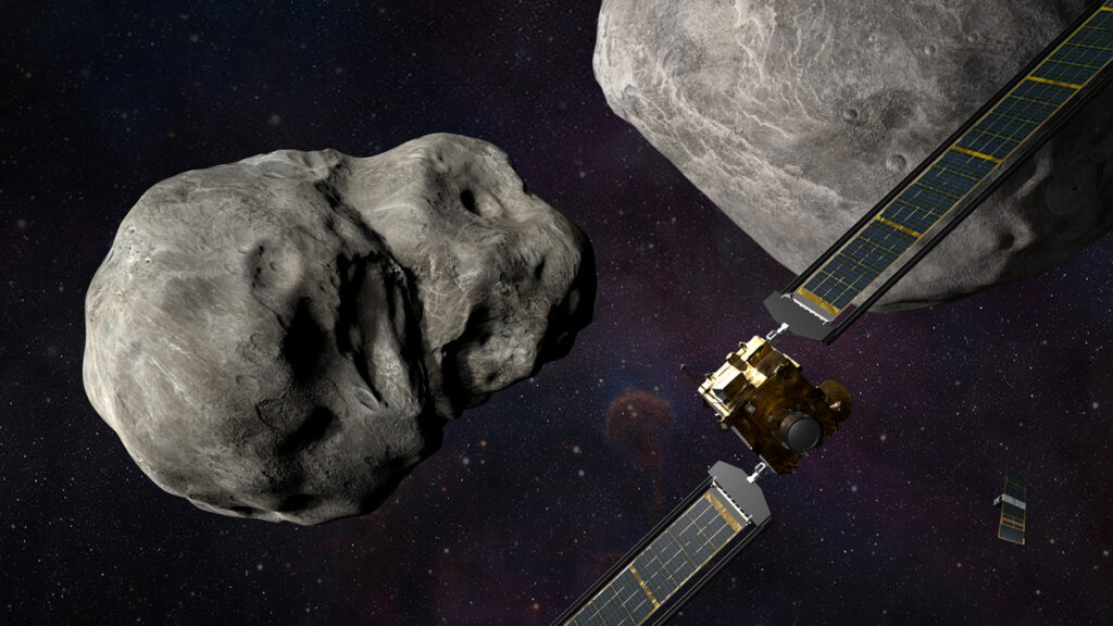 Two spacecraft are visible between two large, gray asteroids, with stars in the background.