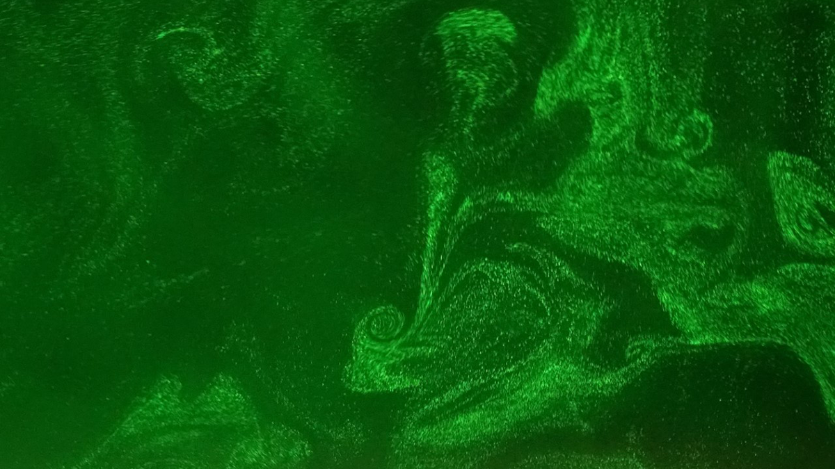 Cloud droplets in turbulent convection within the Pi Chamber.