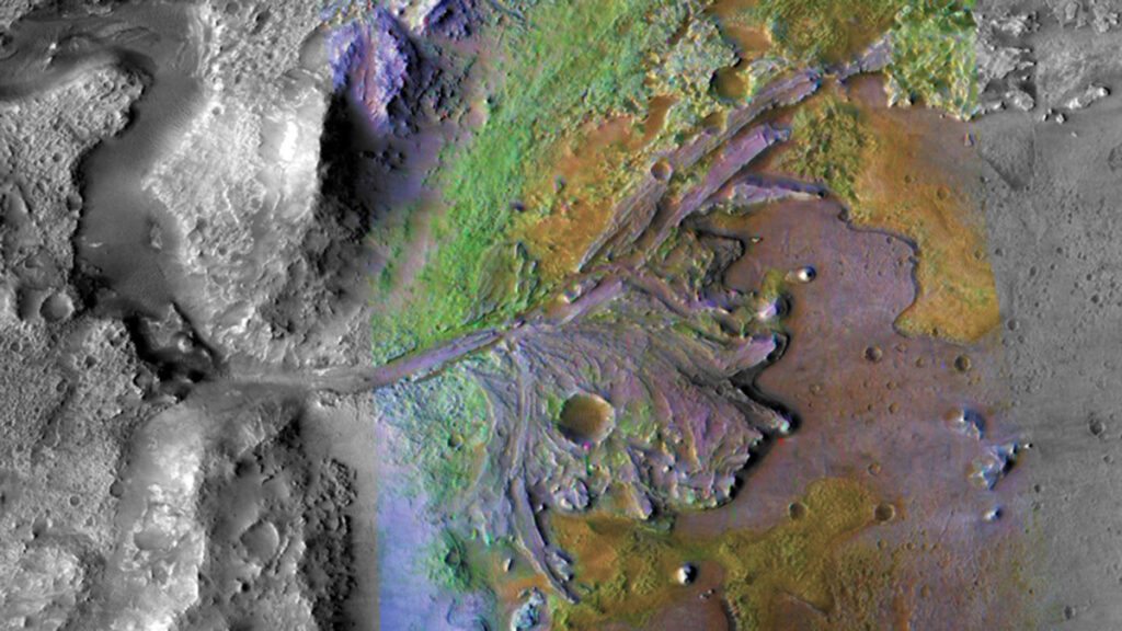 A satellite image of the surface of Mars showing snaking channels and other water-sculpted features