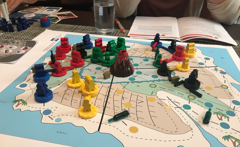 A board game with colorful game pieces