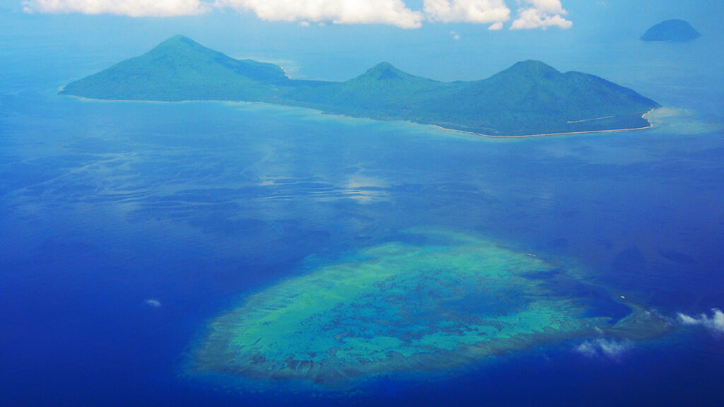 Aerial view of the island of Emae, Vanuatu, surrounded by ocean