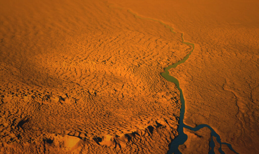 Artist’s conception of a river flowing through dunes on Titan.