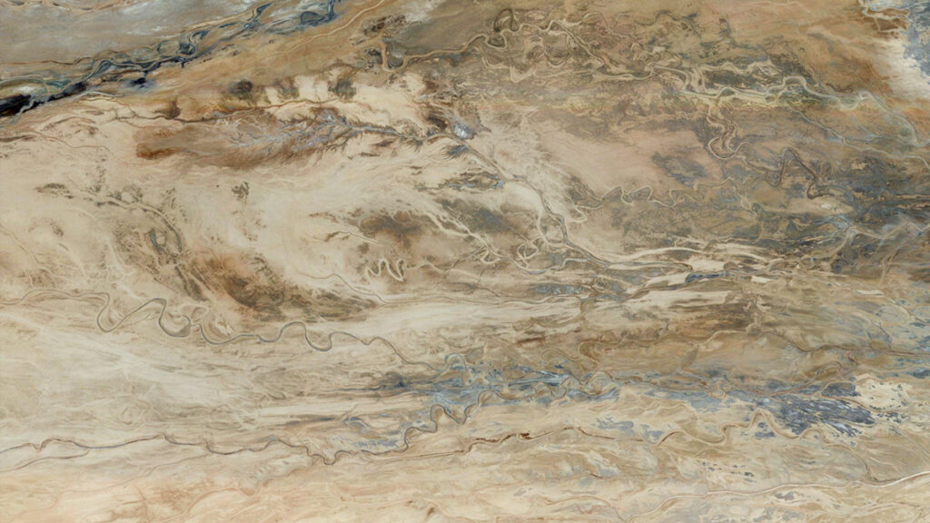 Satellite view of part of Badwater Basin in Death Valley, Calif., showing meandering river channels running through the arid landscape