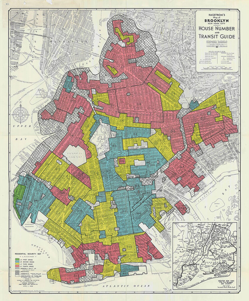 An old-looking map with red, yellow, blue, and green polygons overlying smaller black boxes