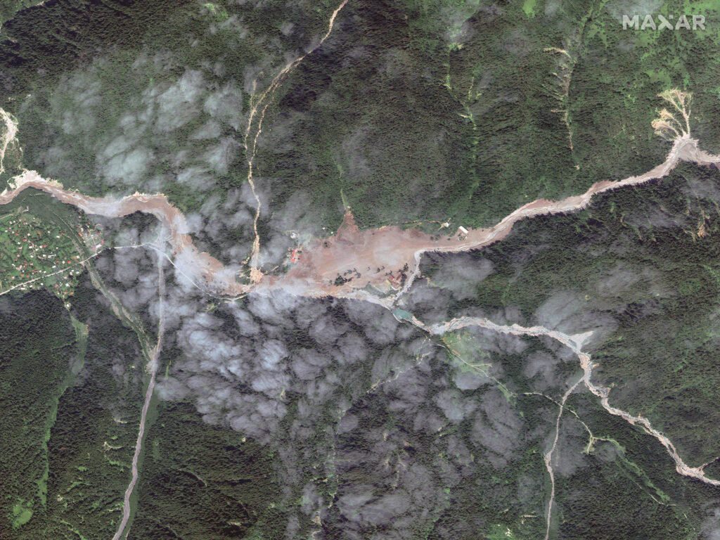 A satellite image provided by Maxar showing the aftermath of the Shovi landslide.