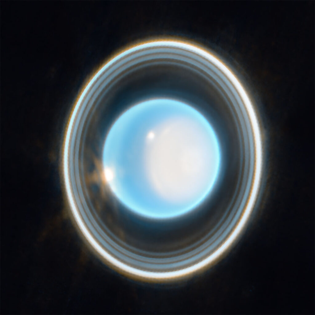 The James Webb Space Telescope captured this image of Uranus, the “blue billiard ball,” along with its narrow ring system and several of its moons, on 6 February 2023.
