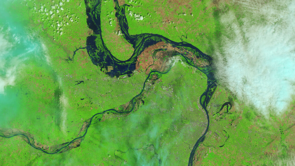 Satellite image of the Mississippi River surrounded by a green landscape