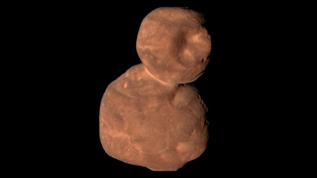 A red object with two lobes connected by a thin neck.