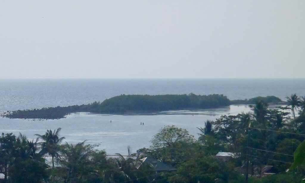 A small island is visible off the coast of the mainland.