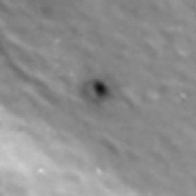 The supposed impact crater on Io up close. It appears to have a bowl shape with a surrounding dark halo.