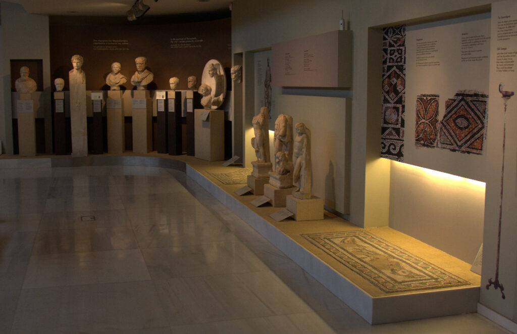 Interior of a modern museum with sculptures and artifacts