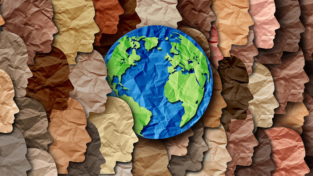 Graphic depicting profiles of numerous featureless human heads, all looking to the right, that appear to be cut from crumpled paper of different colors. In the middle is a blue and green depiction of Earth with the same paper texture.