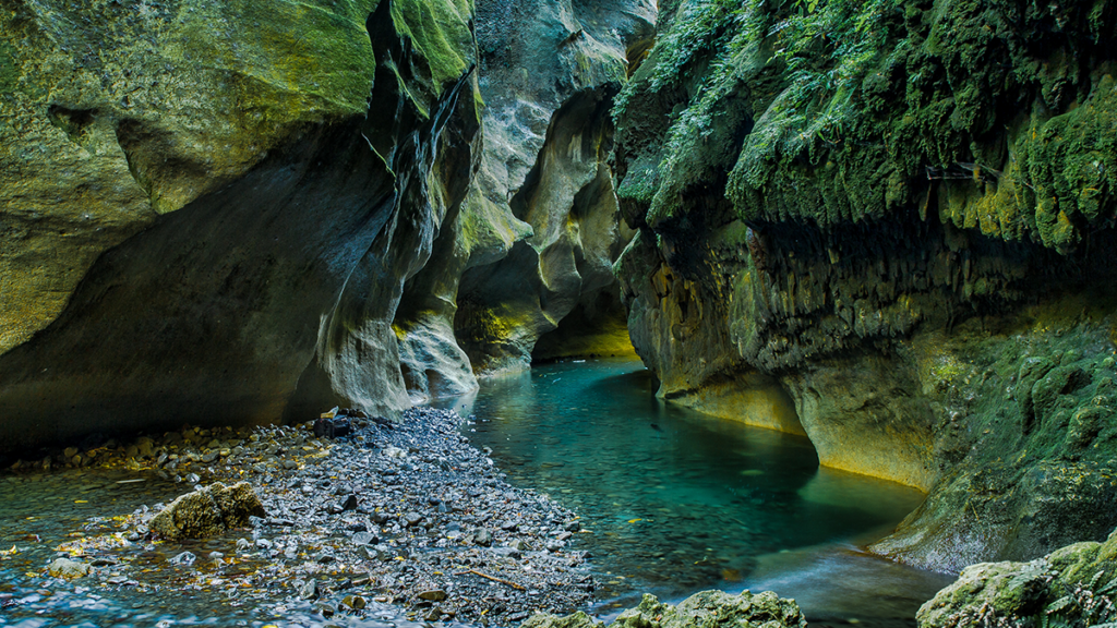 A small river coursing through a rock gorge.