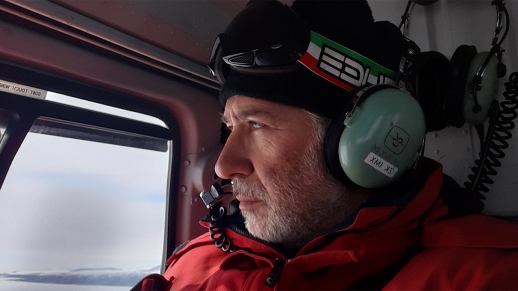 Photo of Fabio Florindo in a helicopter.