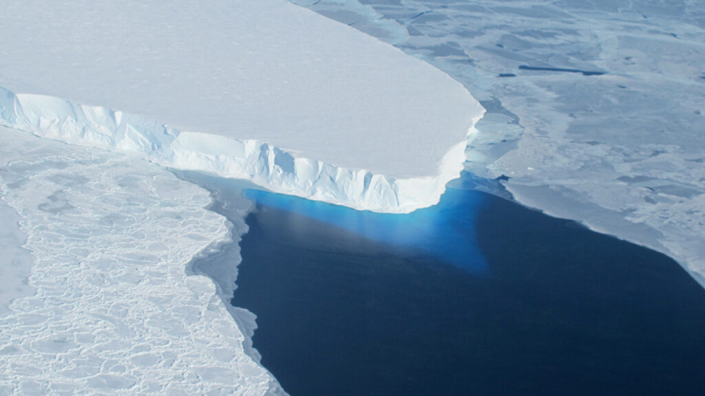 A glacier in blue water