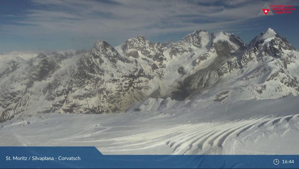 A webcam image of the aftermath of the Piz Scerscen rock avalanche, captured at 16:44 from the Corvatsch skiing station.