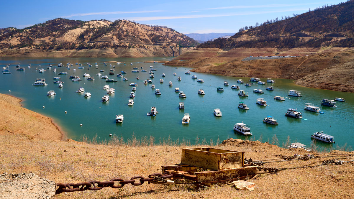 Boats float in low-water conditions in California’s Lake Oroville.