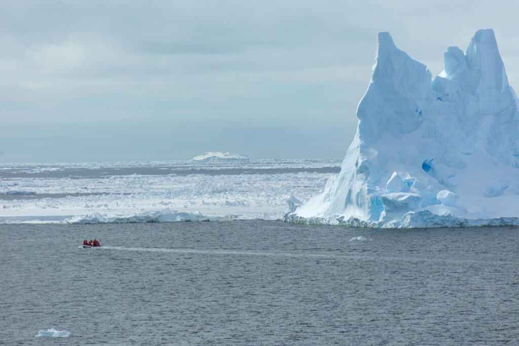 Even in the Antarctic summer, towering icebergs dwarfed Zodiacs in the Amundsen Sea.