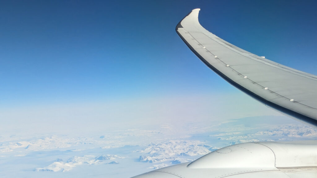 Photo taken out of the window of a flight over Greenland