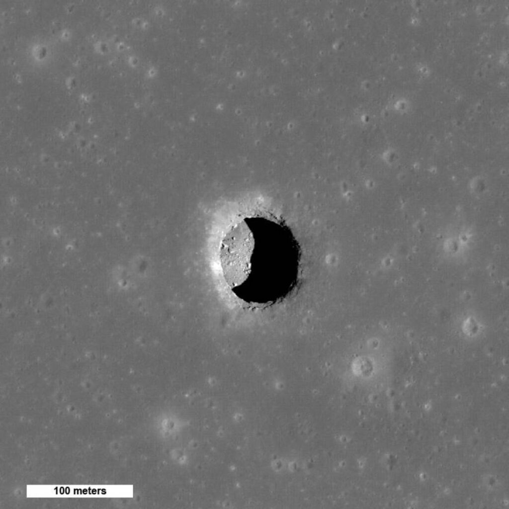 A circular pit on the Moon’s surface.