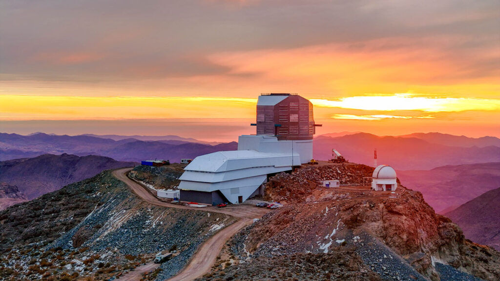 View of Rubin Observatory at sunset in May 2024 on Cerro Pachón in Chile.