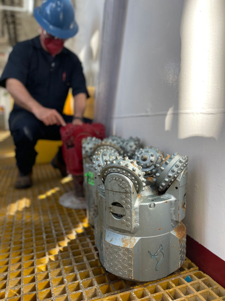 Rotary drills sitting on a ship deck.