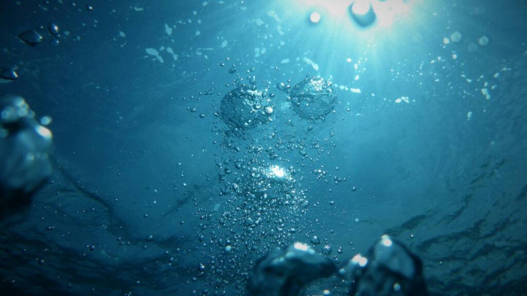 Bubbles bubble up in the ocean.
