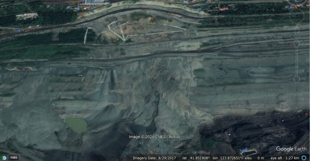 Google Earth image from August 2017 showing the failure at Fushun West OPM.