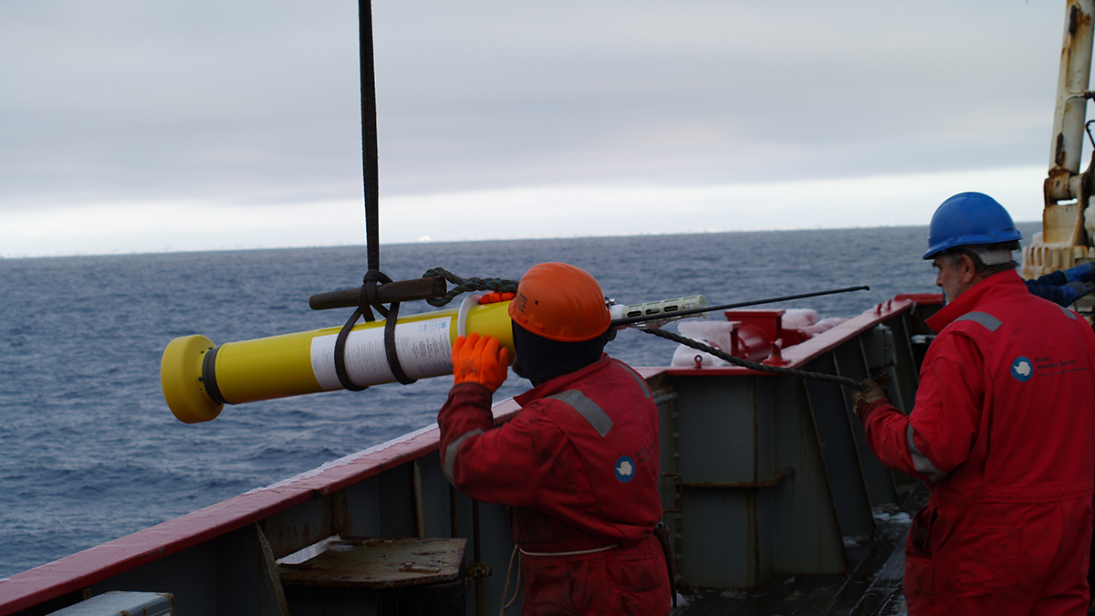 Photo of researchers deploying an Argo float.