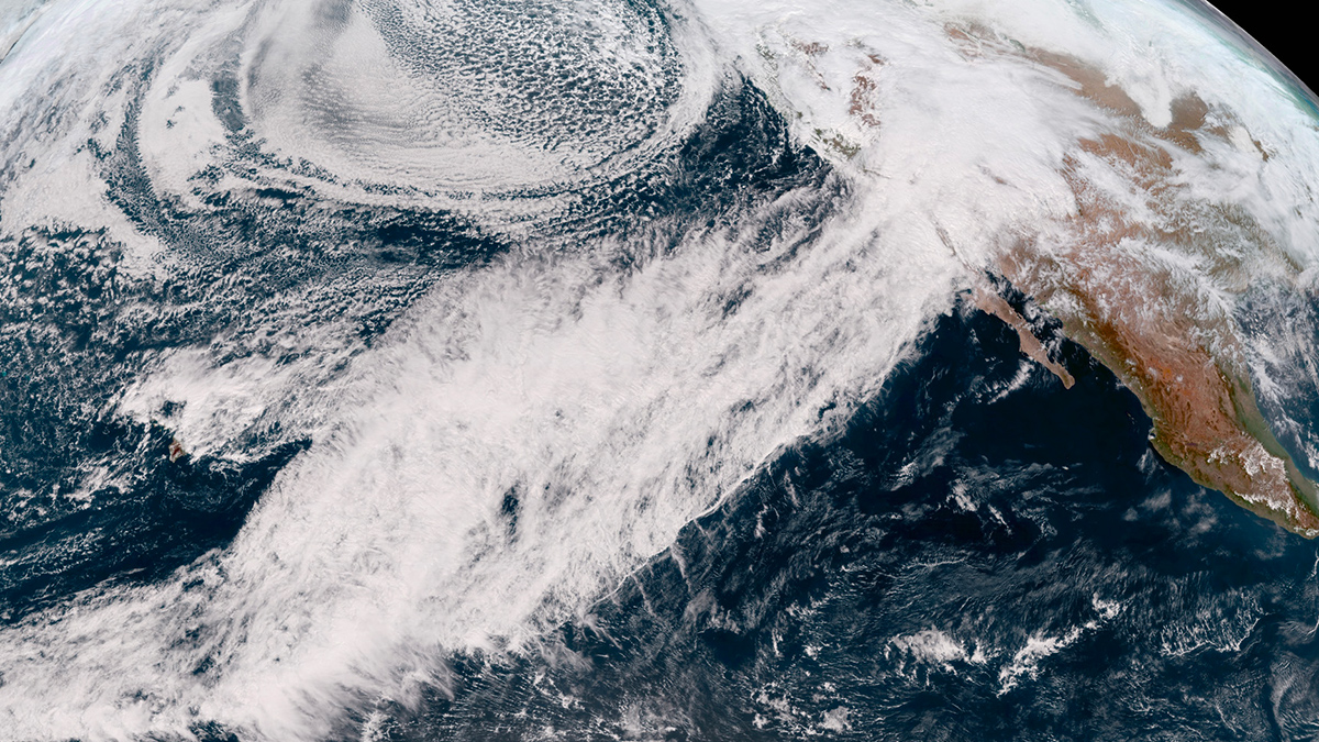 A satellite image of an atmospheric river over the ocean heading toward California