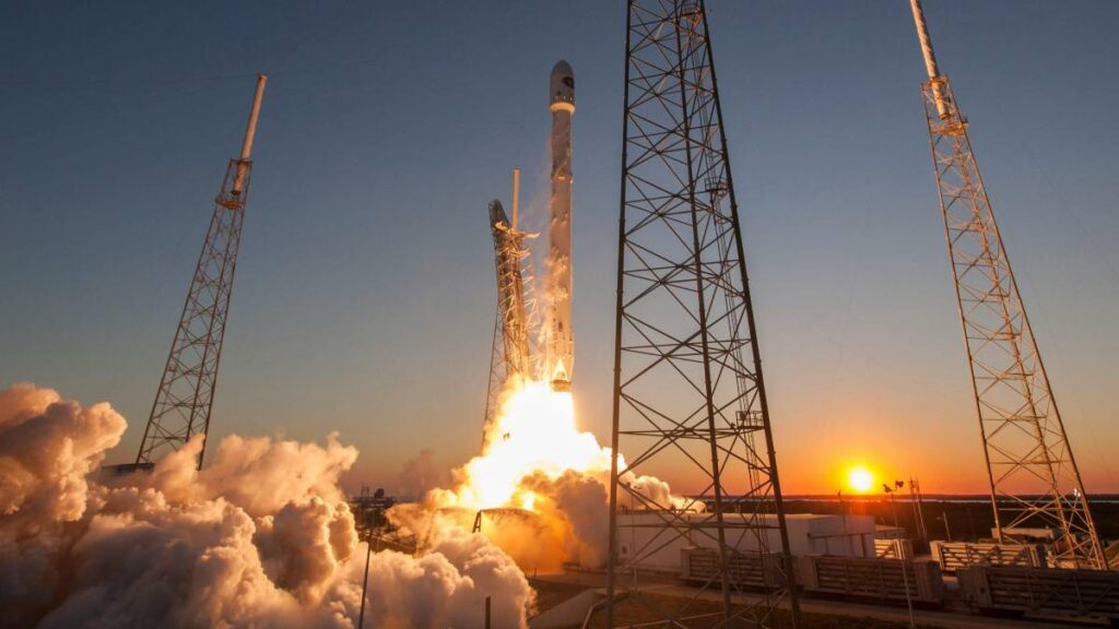 A rocket launches at sundown.