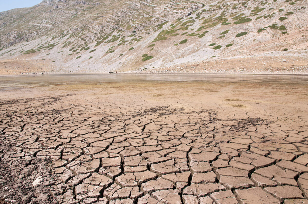 A cracked, polygonal, dried lake basin in Italy shows what the drought conditions were like in 2017.