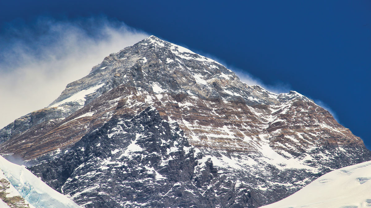 The stratigraphy of Mount Everest is evident in this view of the southwest face of the mountain’s summit pyramid.