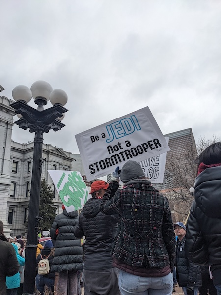 Protest sign: Be a Jedi, not a Stormtrooper