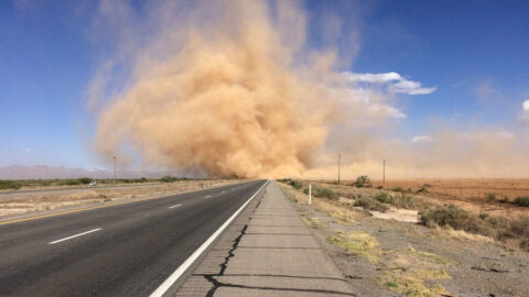 Dust storms on a road in the desert