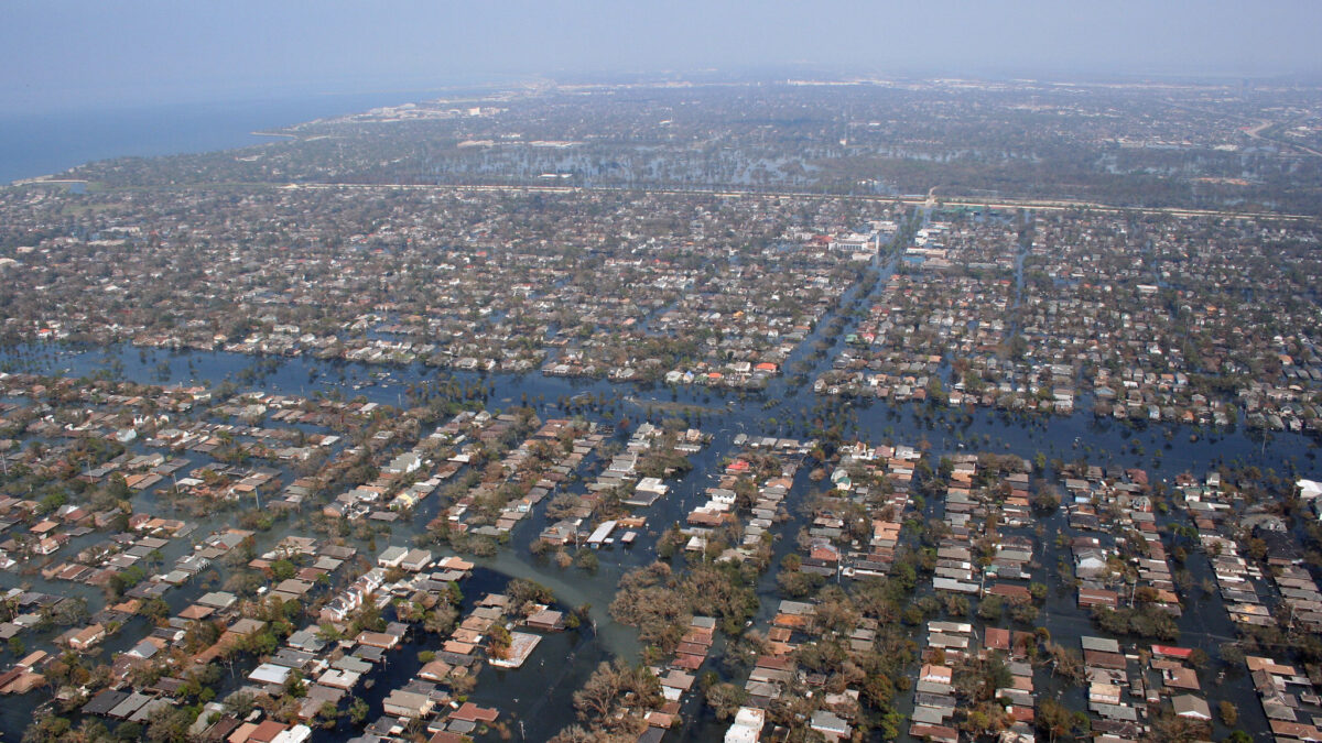 An overhead view of a grid of flooded streets.